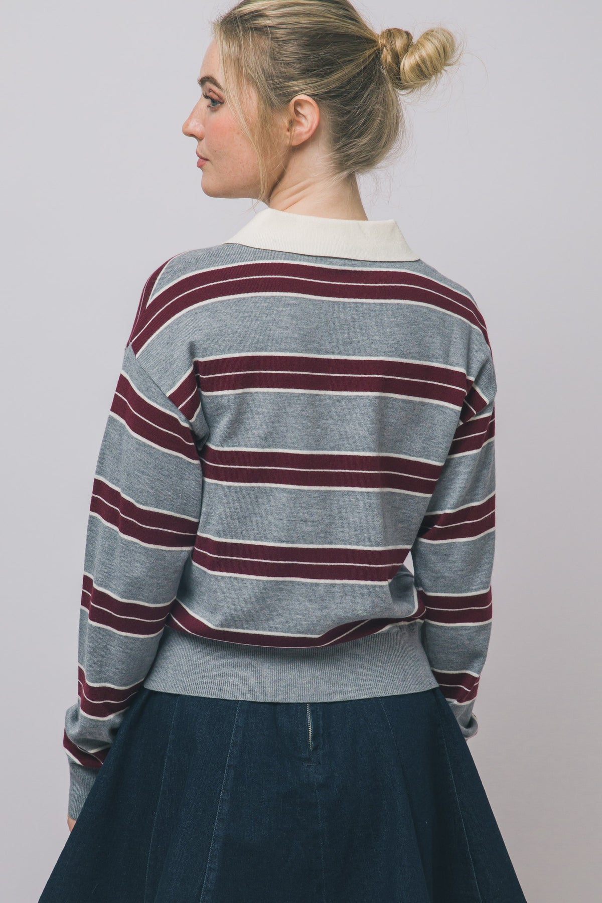 horizontal stripes , ivory polo collar, partial button-up neckline.