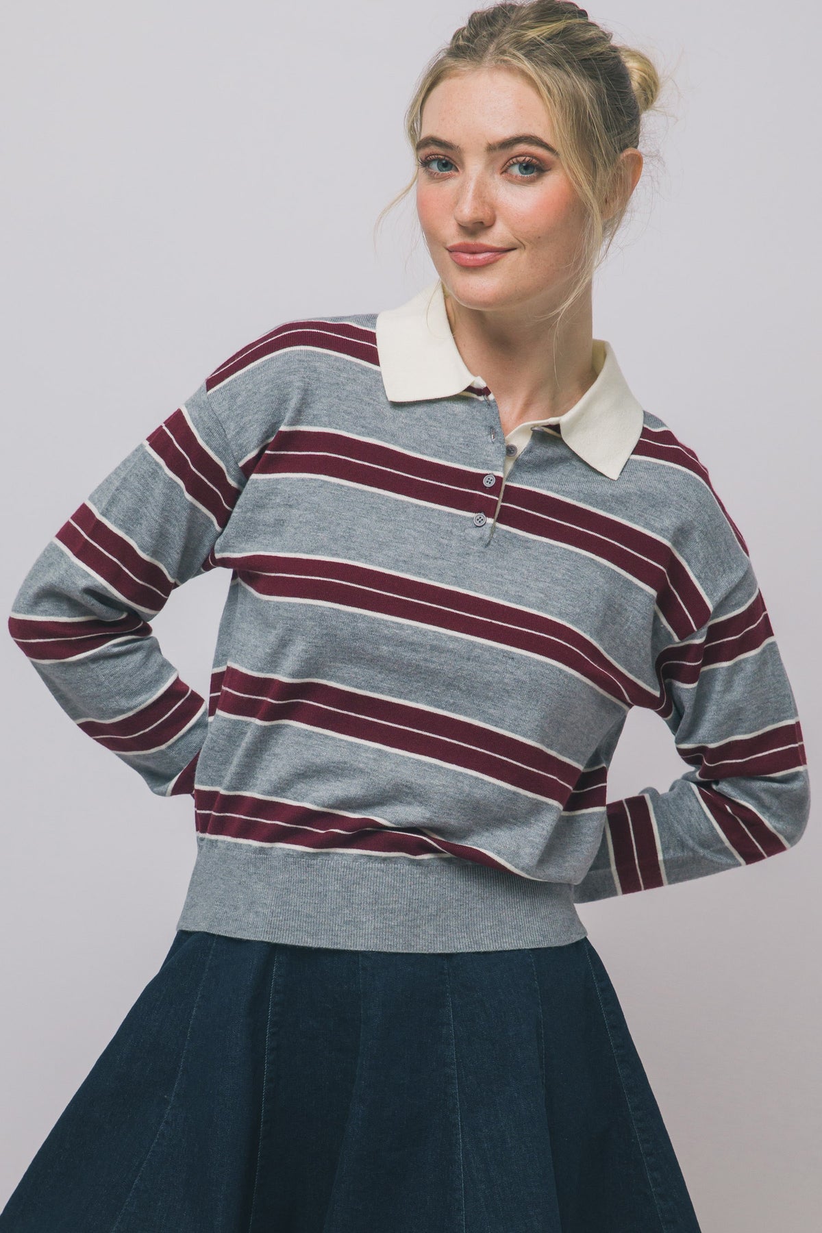 horizontal stripes , ivory polo collar, partial button-up neckline.